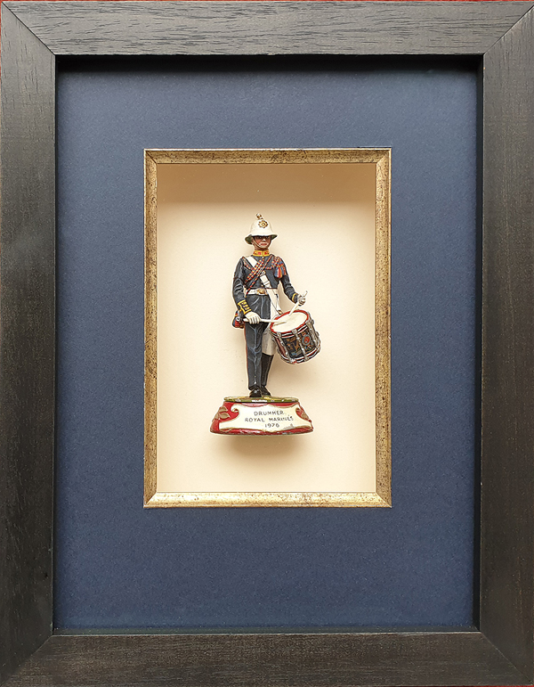 Military model framed in a box frame