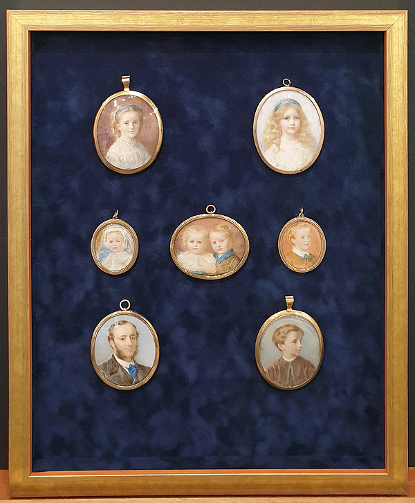 Set of portrait miniatures framed